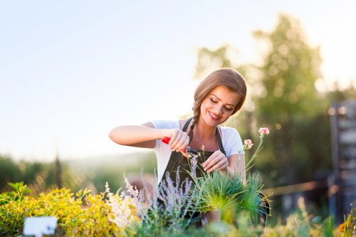 Team of landscapers beginning a garden project in Purley