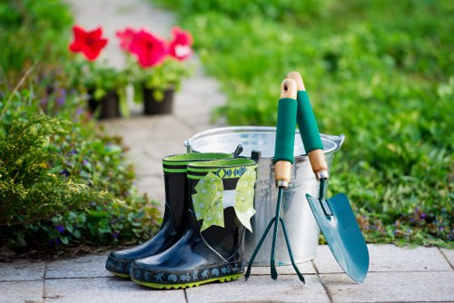 A gardener planning an accessible landscaping layout in Purley